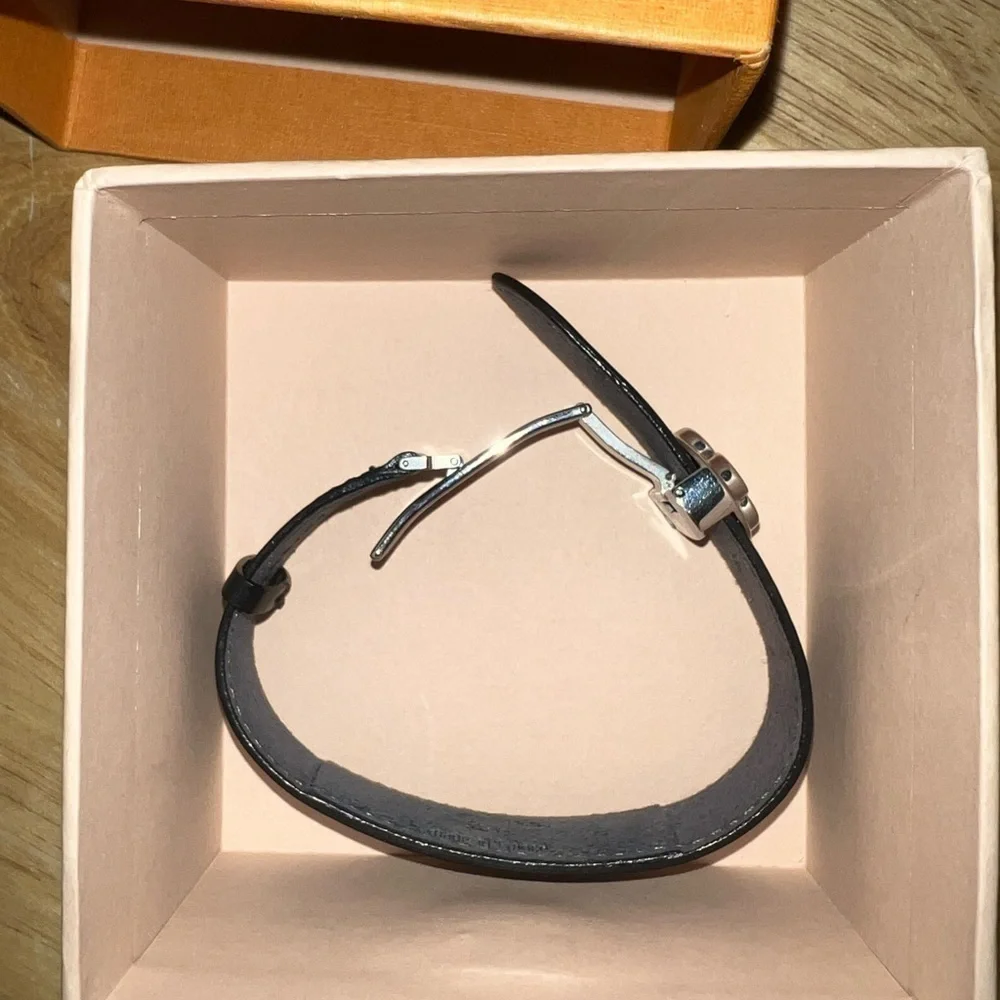 Louis Vuitton black adjustable monogram bracelet.